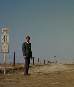 A faint speck in the distance, Roger Thornhill (Cary Grant) has no idea of what's about to happen to him.